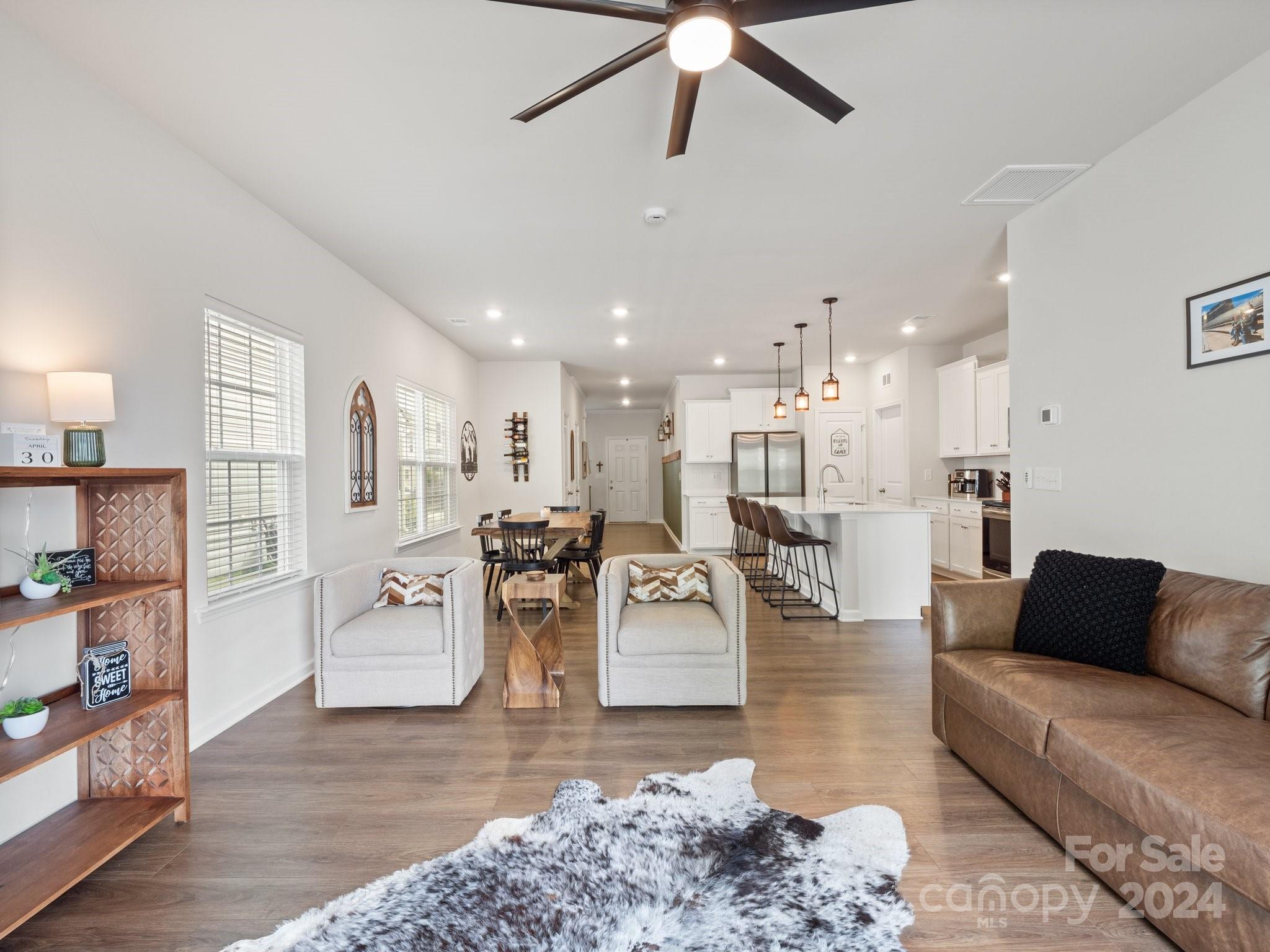 6515 Gopher Road Lancaster, SC 29720 - Photo 17 of 35 a living room with furniture and a wooden floor