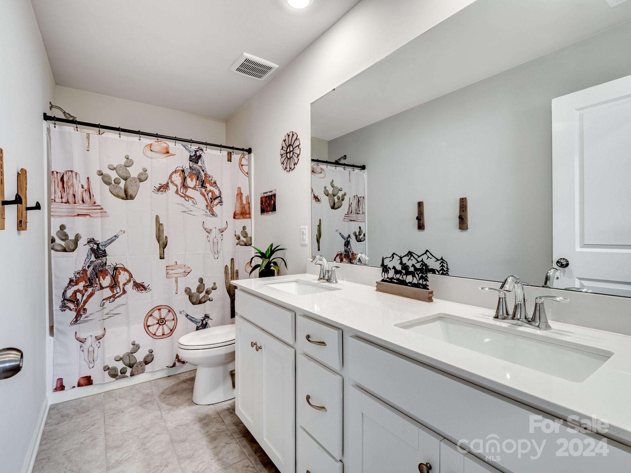 6515 Gopher Road Lancaster, SC 29720 - Photo 25 of 35 a bathroom with a sink and a mirror