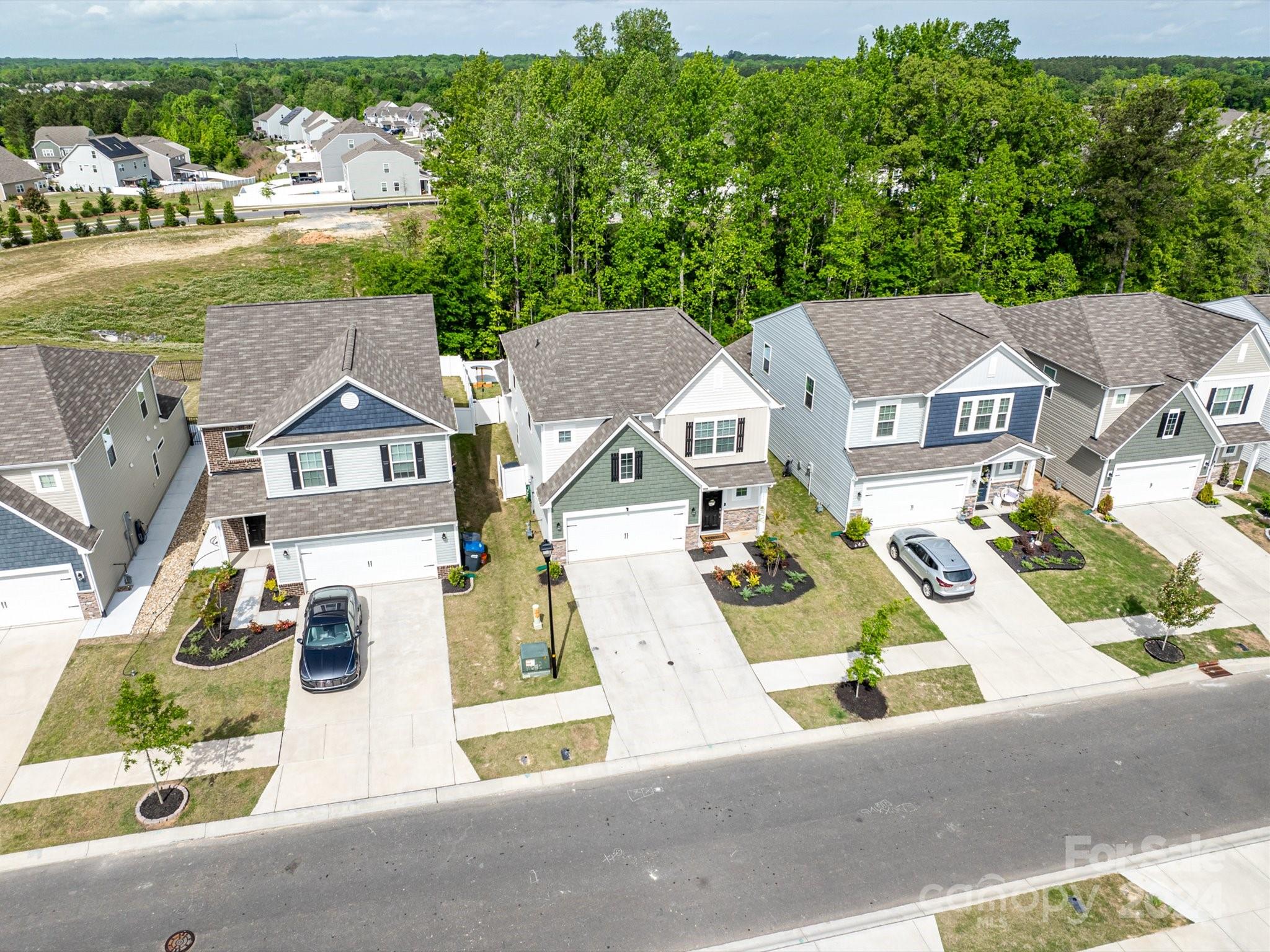 6515 Gopher Road Lancaster, SC 29720 - Photo 3 of 35 an aerial view of residential houses with outdoor space