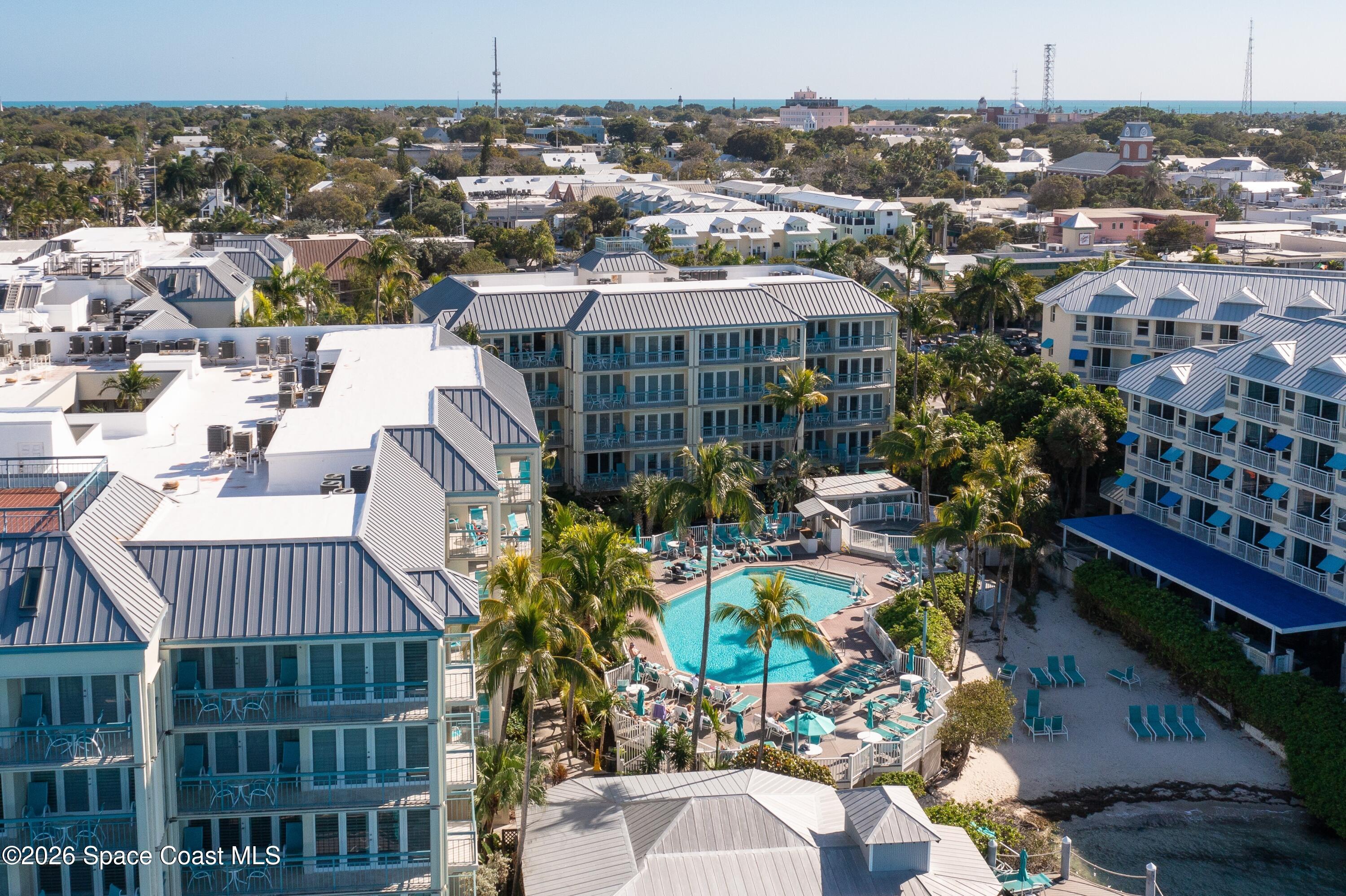 617 Front Street, Unit A52 Key West, FL 33040 - Photo 3 of 42 a view of a city that has tall trees