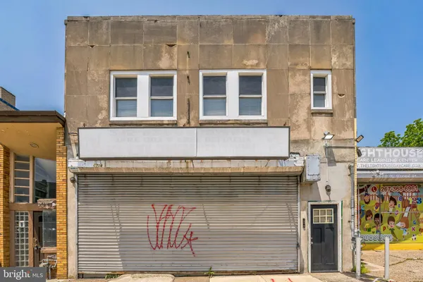 a front view of a building with glass windows