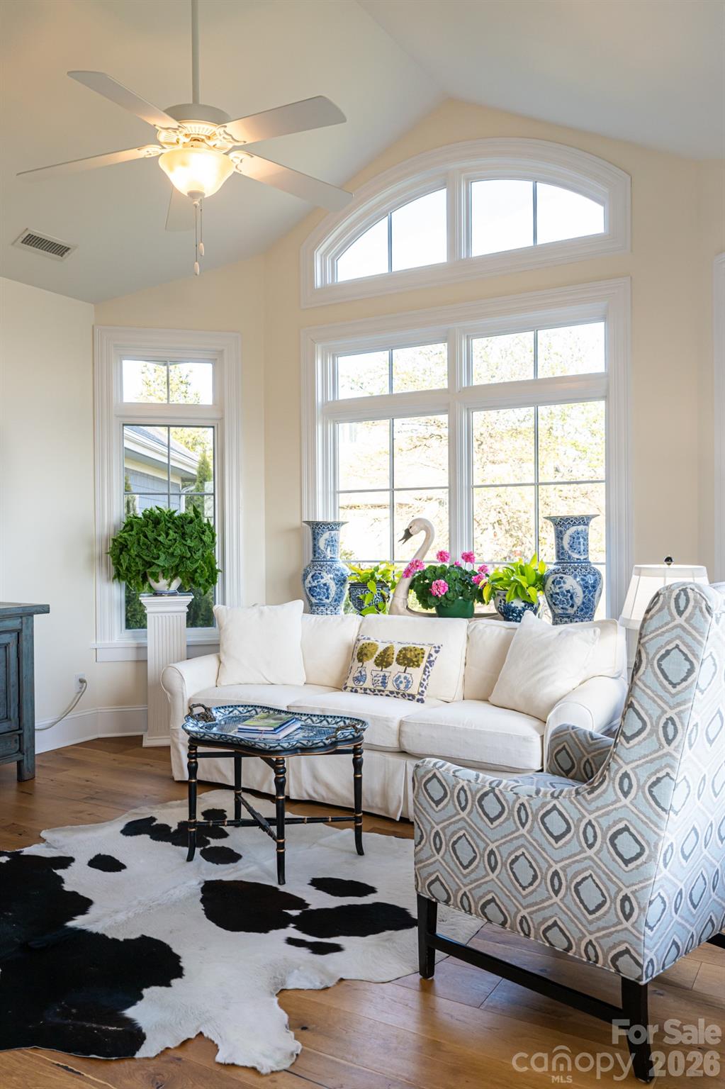 89 North Snow Ridge Drive, Unit 13 Hendersonville, NC 28792 - Photo 24 of 47 a living room with furniture and a large window