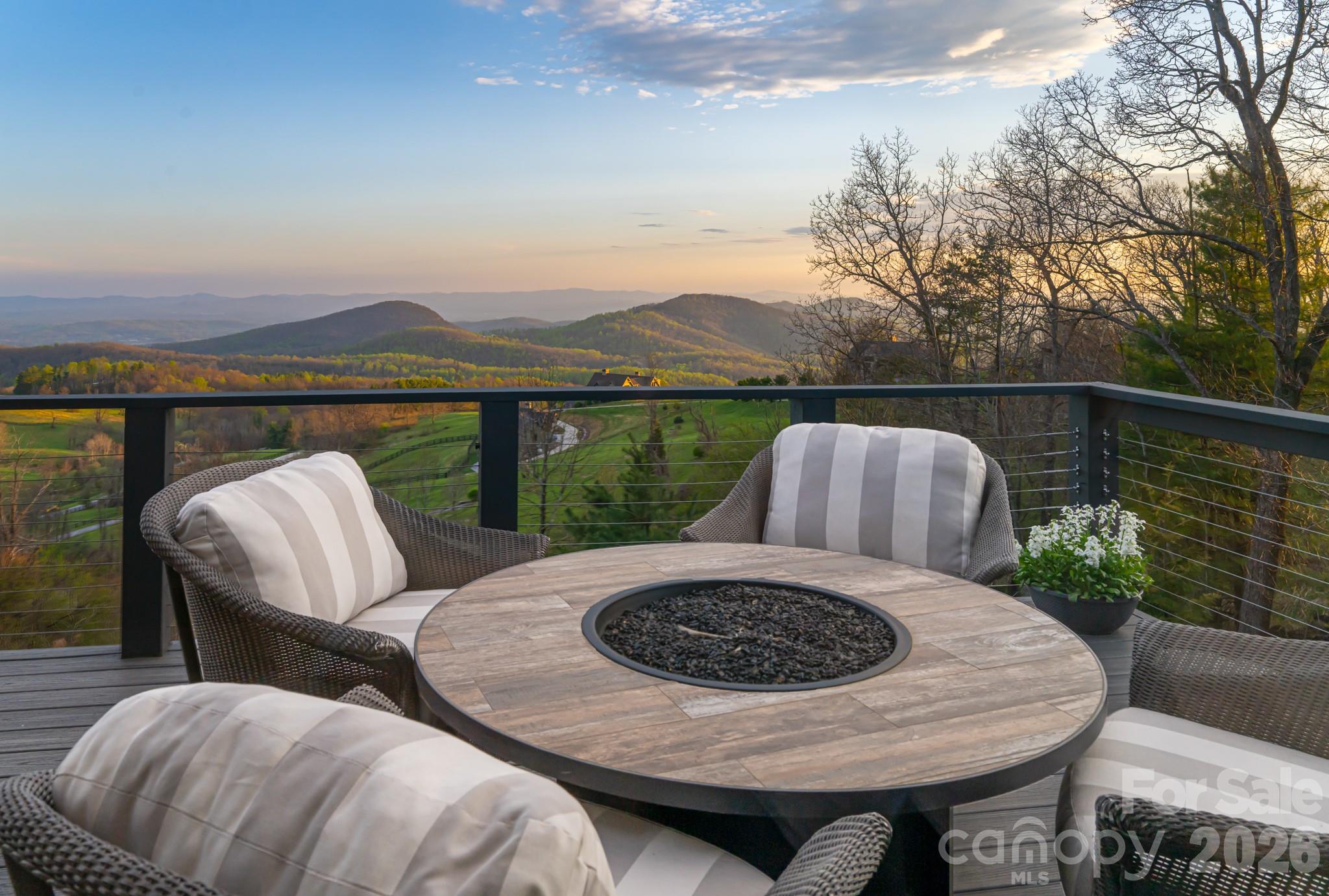 89 North Snow Ridge Drive, Unit 13 Hendersonville, NC 28792 - Photo 32 of 47 a view of balcony with furniture and outdoor space