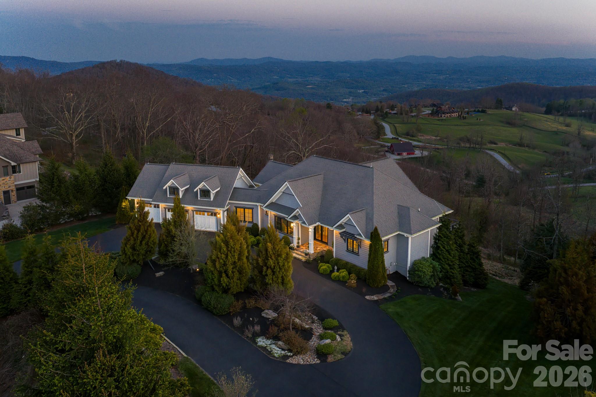 89 North Snow Ridge Drive, Unit 13 Hendersonville, NC 28792 - Photo 45 of 47 an aerial view of multiple house
