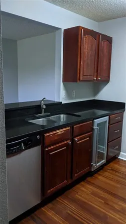 a kitchen with a stove and a microwave