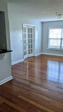 a bathroom with a sink toilet and a mirror