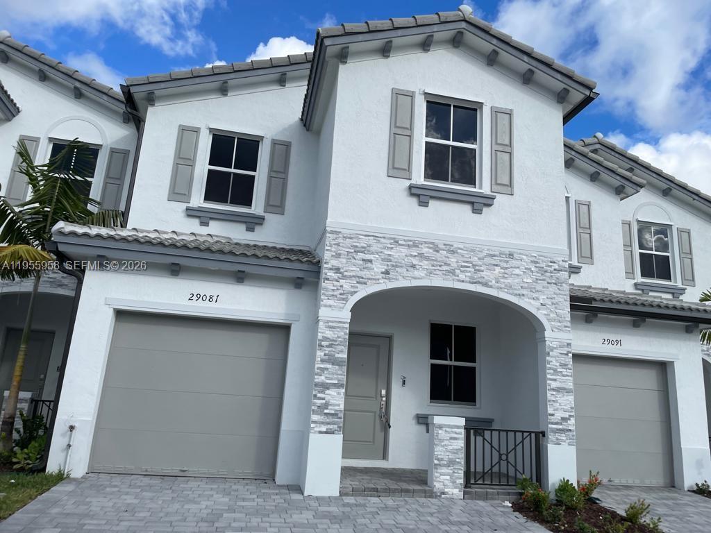 29081 Southwest 162th Court Homestead, FL 33033 - Photo 1 of 18 a front view of a house with windows