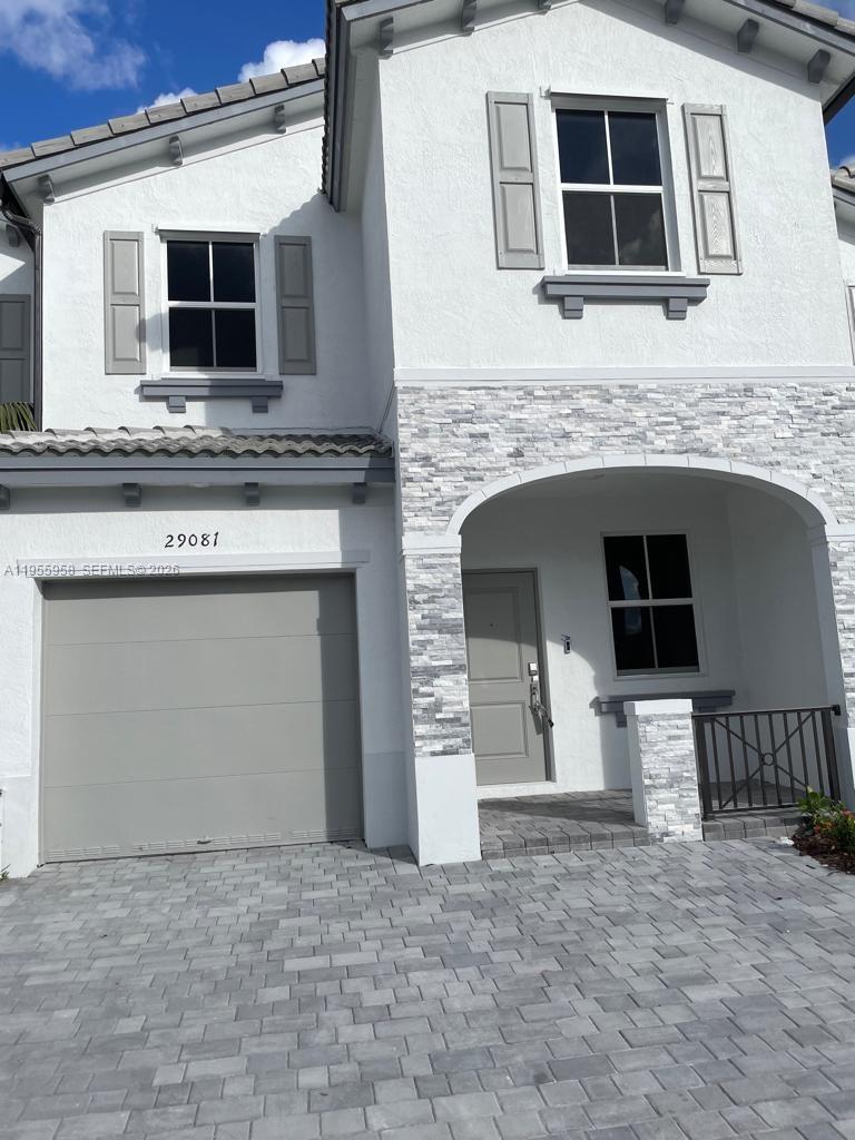 29081 Southwest 162th Court Homestead, FL 33033 - Photo 3 of 18 a front view of a house with windows