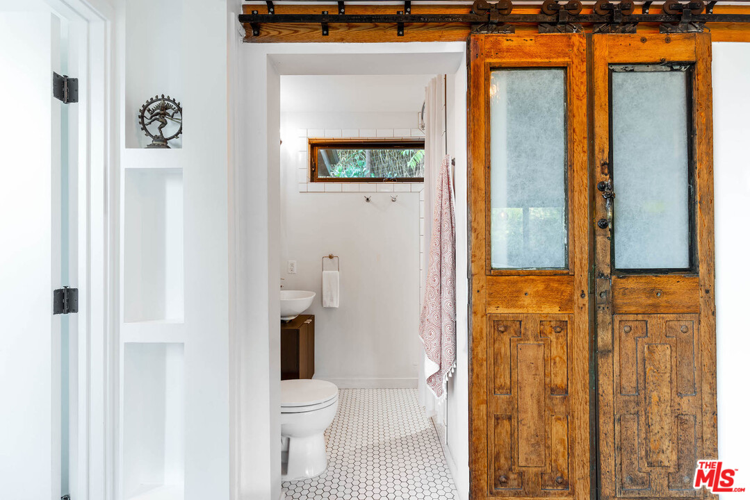 2016 Ewing Street Los Angeles, CA 90039 - Photo 12 of 33 a bathroom with a toilet and a shower