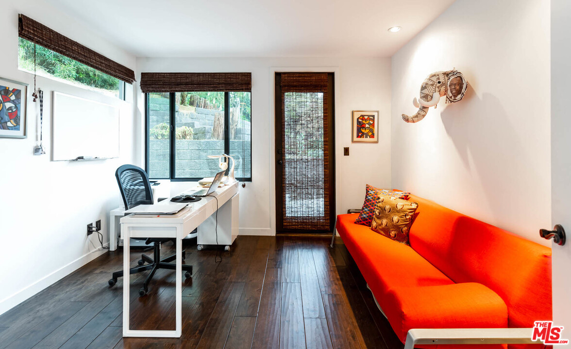 2016 Ewing Street Los Angeles, CA 90039 - Photo 17 of 33 a workspace with furniture and wooden floor
