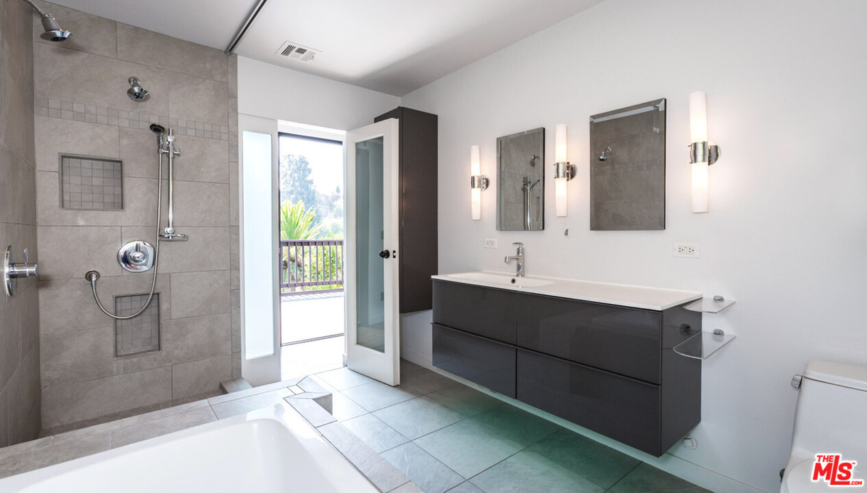 2016 Ewing Street Los Angeles, CA 90039 - Photo 19 of 33 a bathroom with a sink and a mirror