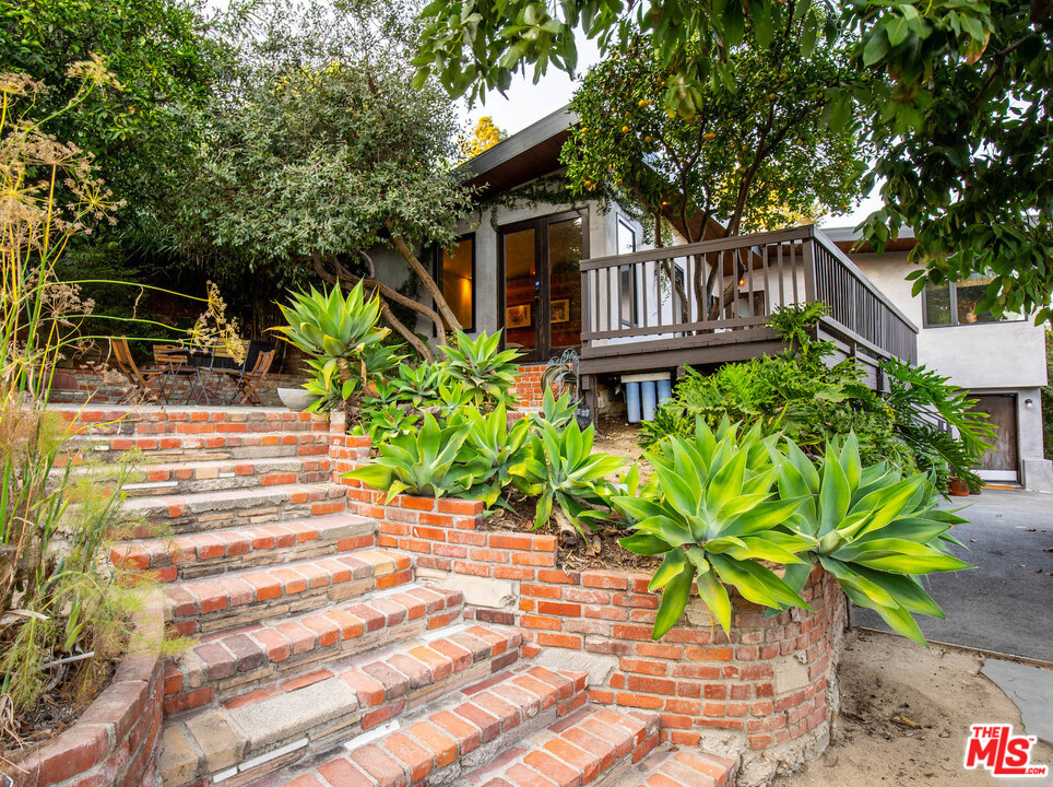 2016 Ewing Street Los Angeles, CA 90039 - Photo 23 of 33 a front view of a house with a yard