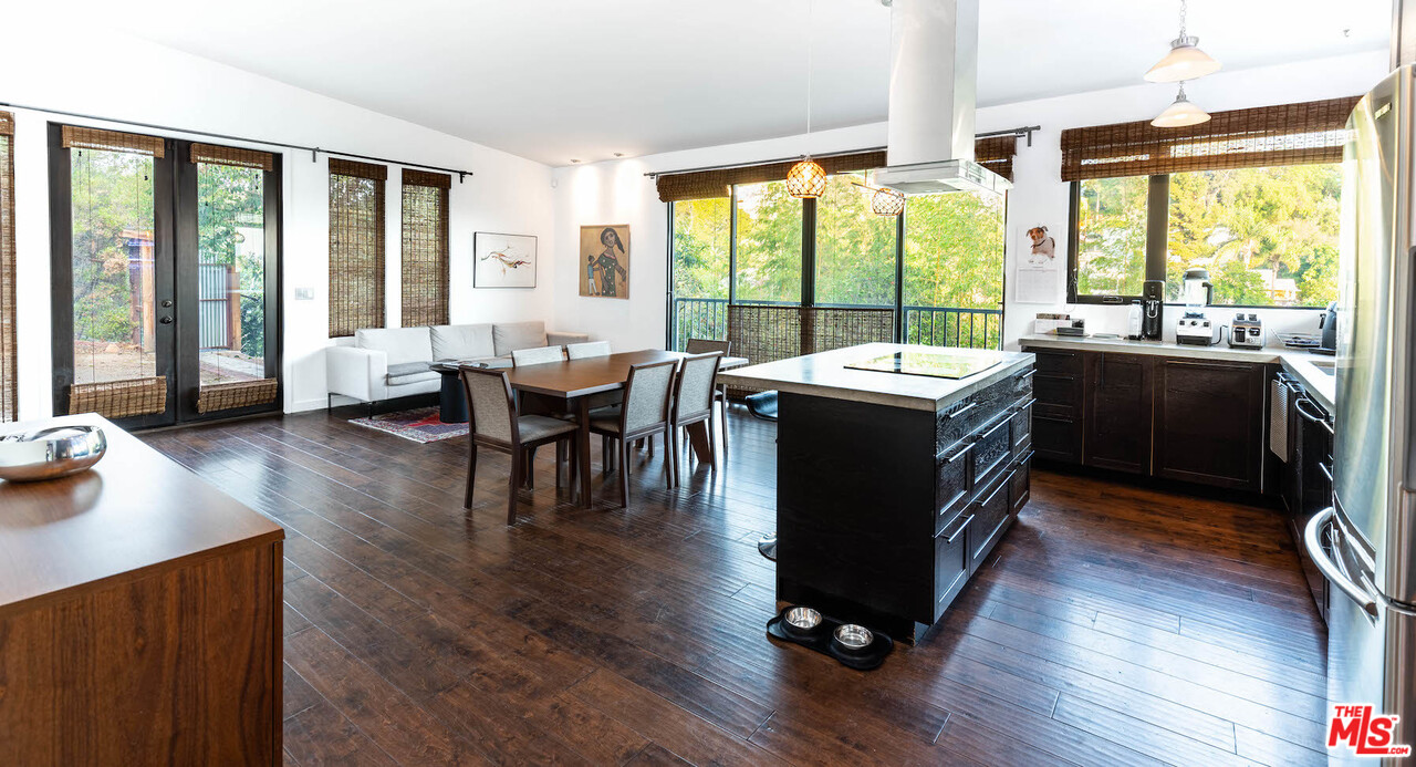 2016 Ewing Street Los Angeles, CA 90039 - Photo 5 of 33 a living room with furniture stove and wooden floor