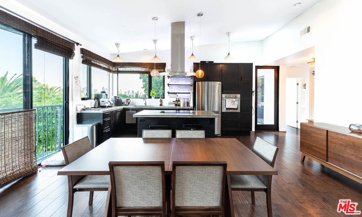 2016 Ewing Street Los Angeles, CA 90039 - Photo 6 of 33 a view of a dining room with furniture window and wooden floor