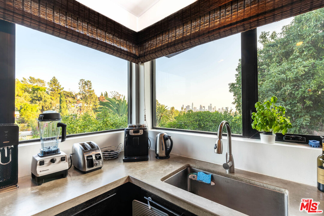 2016 Ewing Street Los Angeles, CA 90039 - Photo 9 of 33 a kitchen with a large window and a sink