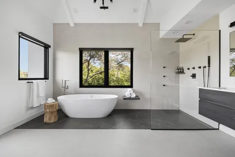 a living room with a couch and a window