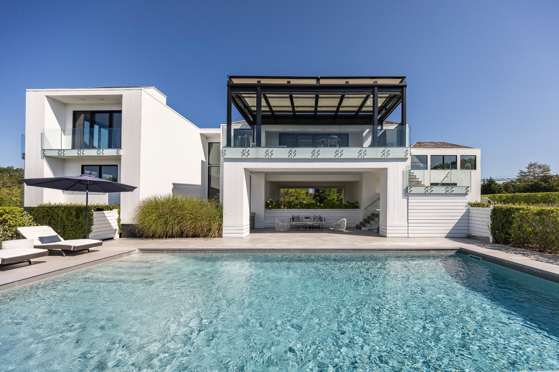 1076 Ocean Road Bridgehampton, NY 11932 - Photo 26 of 35 a view of an empty room with fireplace and a window