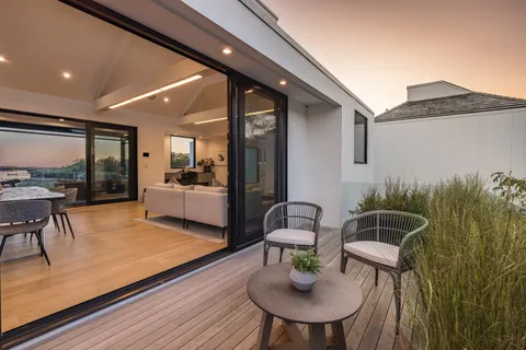 a living room with furniture and a table