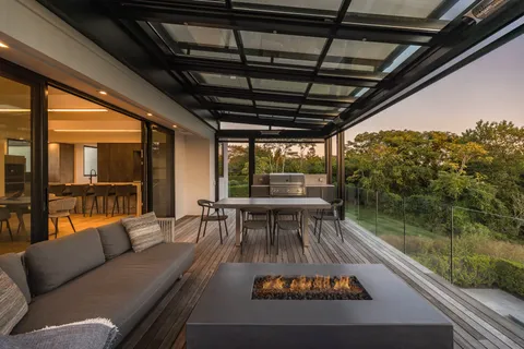 a outdoor dining space with furniture