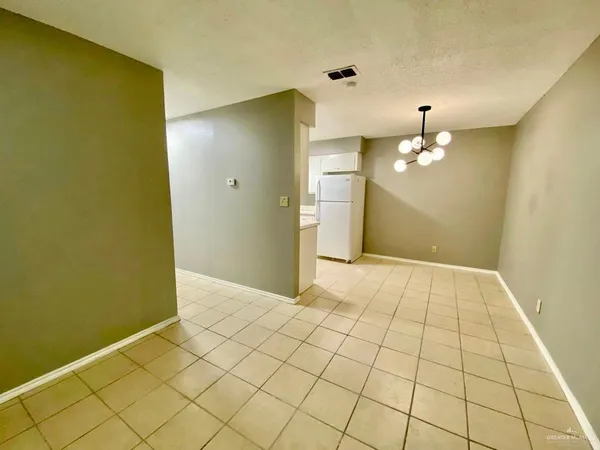 a view of a livingroom with wooden floor