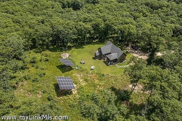 16 Red Coat Hill Road West Tisbury, MA 02568 - Photo 4 of 13 a aerial view of a house with a yard