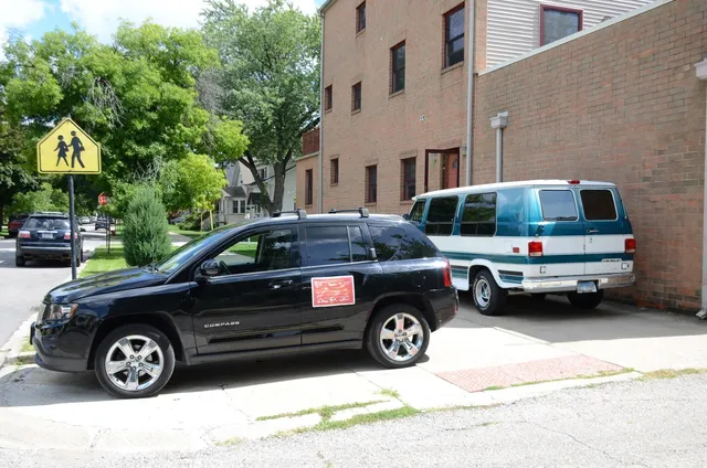 a car parked in front of a house
