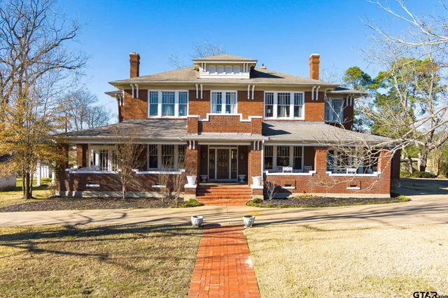 a front view of a building with street view