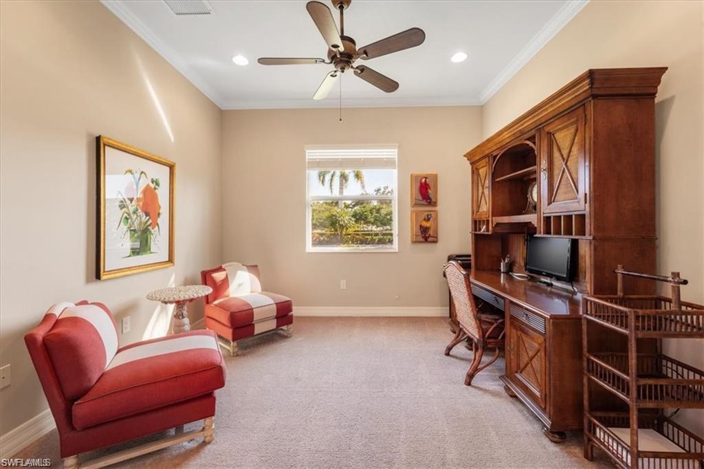 6670 Marbella Lane Naples, FL 34105 - Photo 12 of 24 a bedroom with furniture and a window