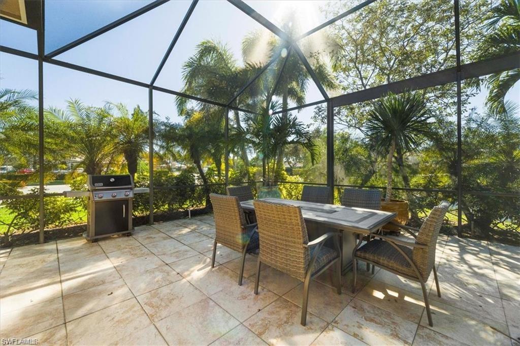 6670 Marbella Lane Naples, FL 34105 - Photo 21 of 24 a view of outdoor space yard and patio