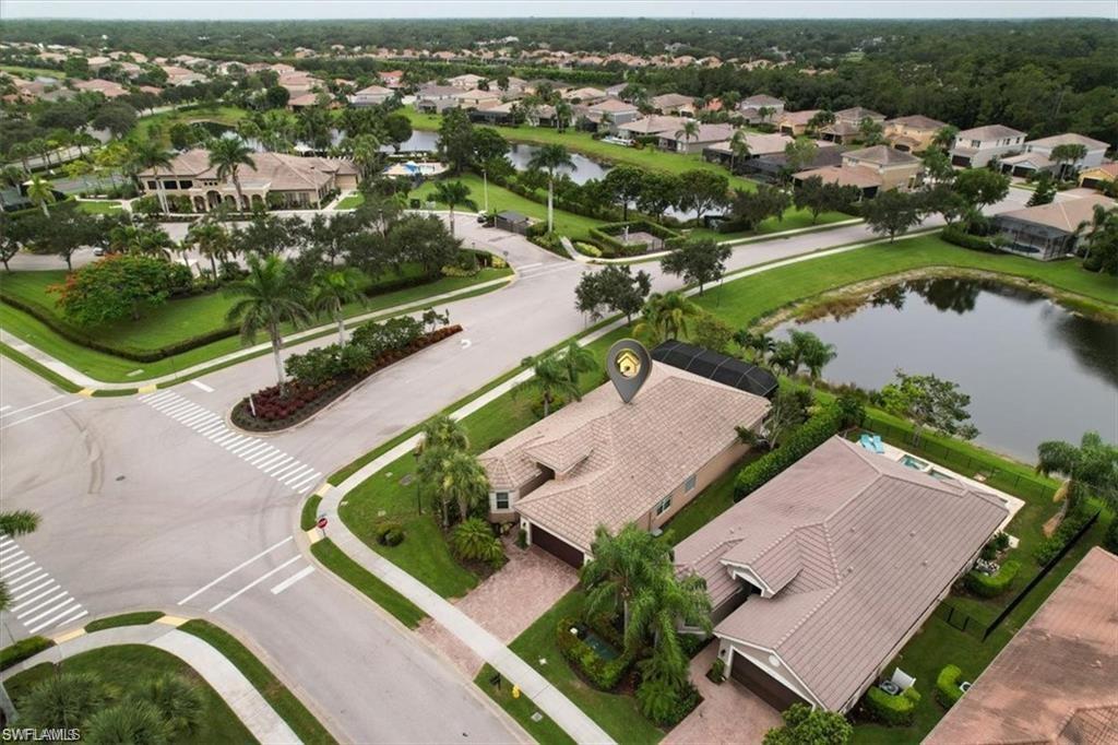 6670 Marbella Lane Naples, FL 34105 - Photo 10 of 24 an aerial view of residential houses with outdoor space
