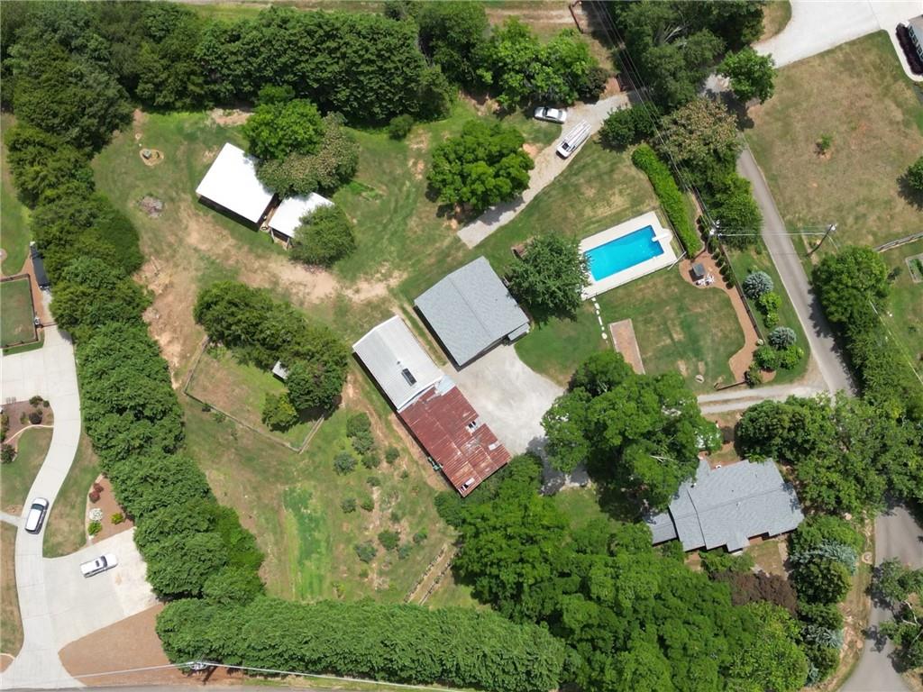 159 Watkins Road Canton, GA 30115 - Photo 1 of 1 an aerial view of a house with swimming pool and outdoor space