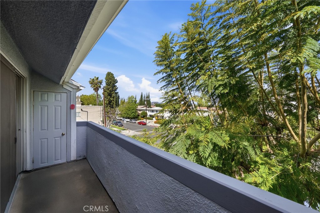 7640 Oso Avenue, Unit 318 Winnetka, CA 91306 - Photo 19 of 43 a view of a garden from a balcony