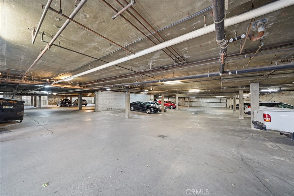 7640 Oso Avenue, Unit 318 Winnetka, CA 91306 - Photo 30 of 43 a view of parking garage with lots of storage
