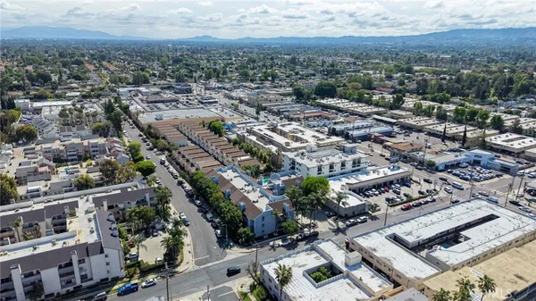 an aerial view of a city with lots of residential buildings