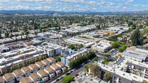 an aerial view of a city with lots of residential buildings