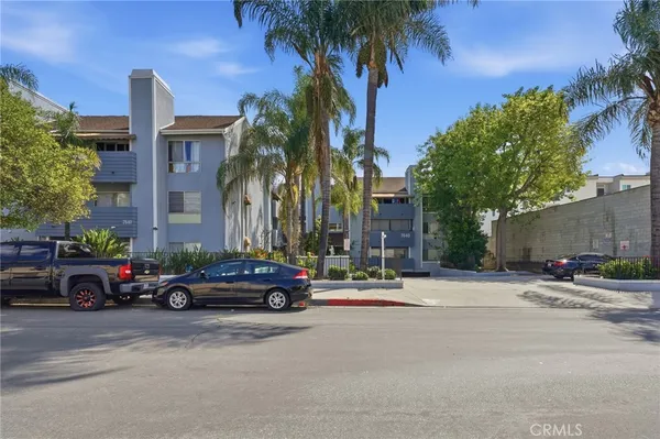 a cars parked in front of a building