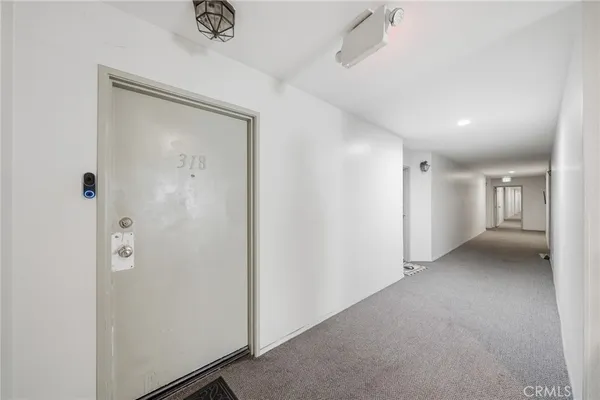 a view of hallway with closet