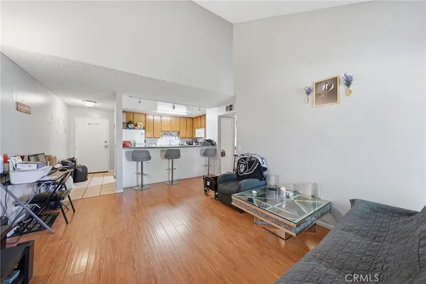 a living room with furniture and a table