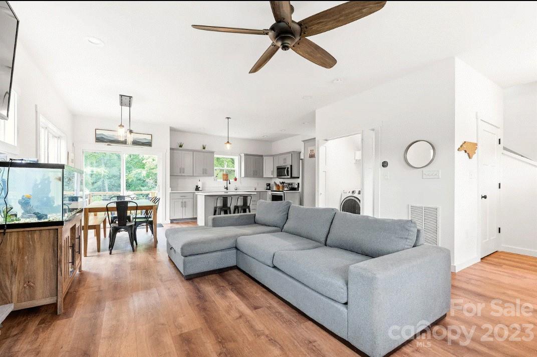 231 Medford Branch Road Candler, NC 28715 - Photo 4 of 28 a living room with furniture and a large window