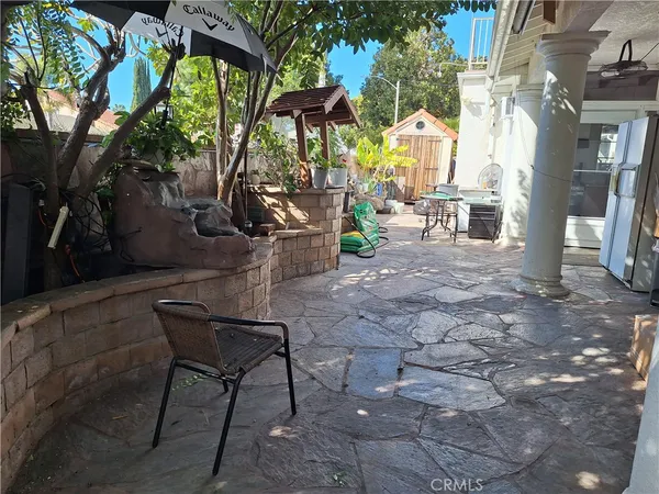 a view of a chairs and tables in the patio
