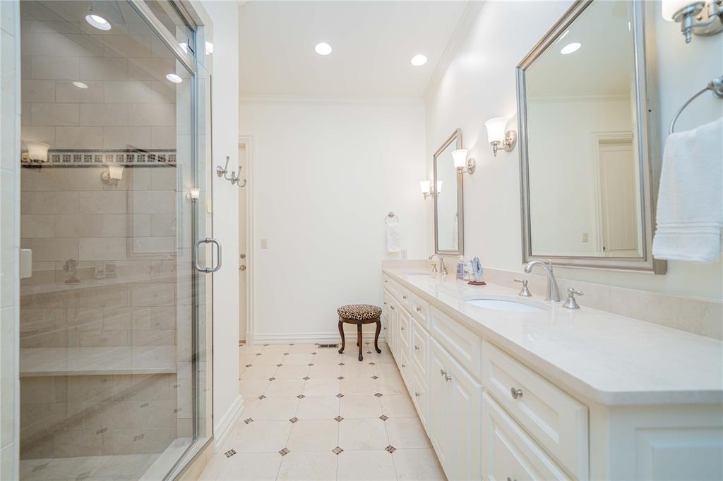 582 Windy Point Mount Vernon, TX 75457 - Photo 22 of 38 Bathroom featuring double vanity, a shower stall, ornamental molding, recessed lighting, and tile patterned flooring