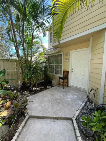 a backyard of a house with seating space
