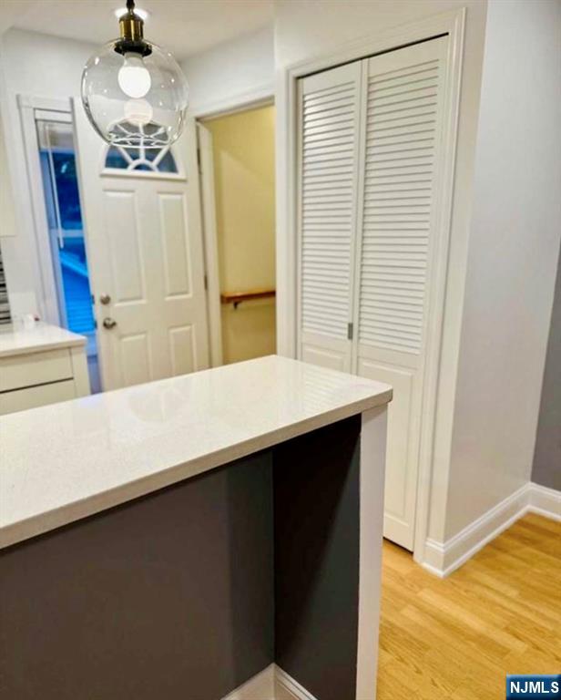 61 Hille Place, Unit 2 Ridgefield Park, NJ 07660 - Photo 13 of 19 a kitchen with a refrigerator and countertop