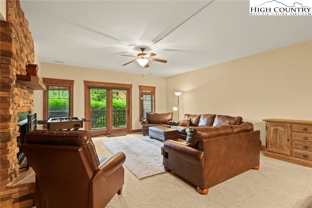 138 South Camp Road, Unit 103 Boone, NC 28607 - Photo 33 of 50 a living room with furniture and a large window