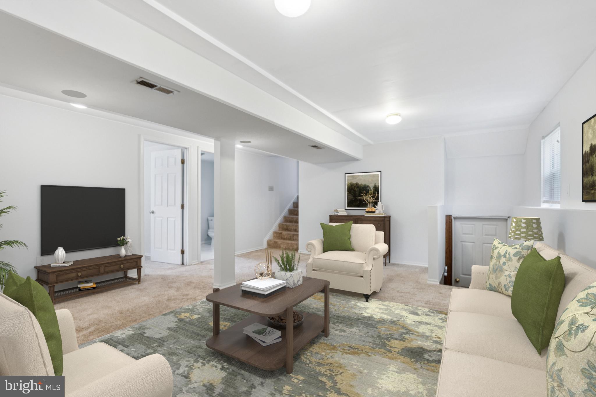 1151 Caton Road Hampstead, MD 21074 - Photo 11 of 43 a living room with furniture and a flat screen tv