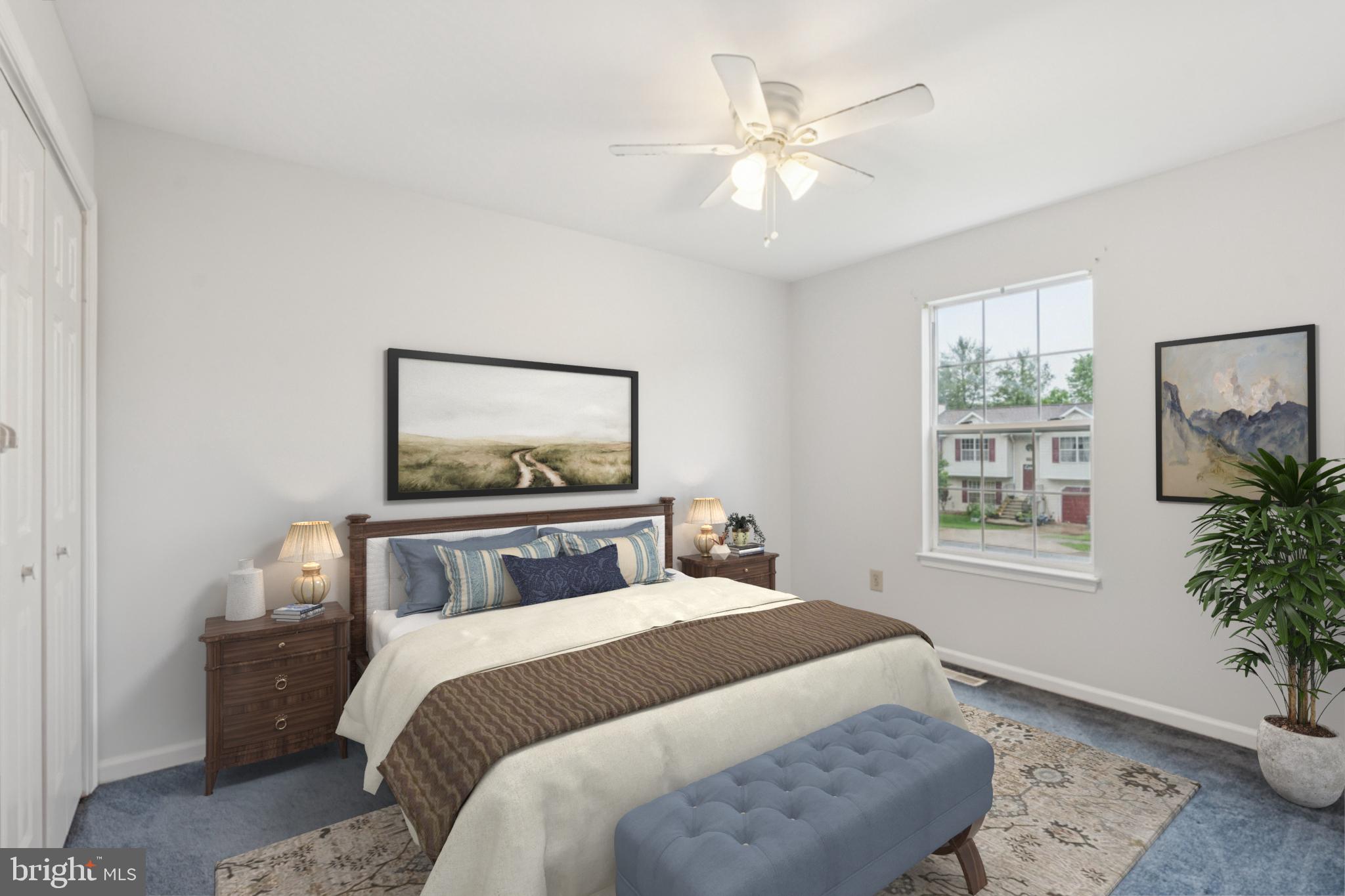 1151 Caton Road Hampstead, MD 21074 - Photo 14 of 43 a bedroom with a large bed and a window