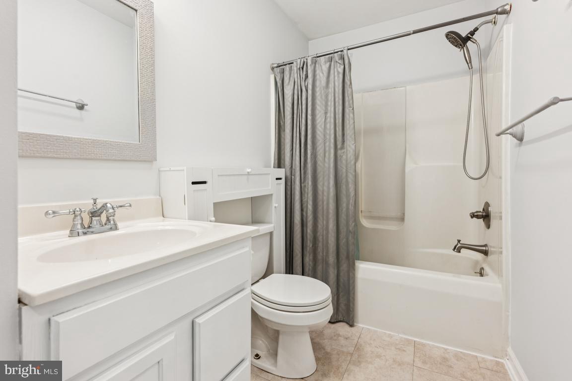 1151 Caton Road Hampstead, MD 21074 - Photo 35 of 43 a bathroom with a sink a toilet and a bathtub