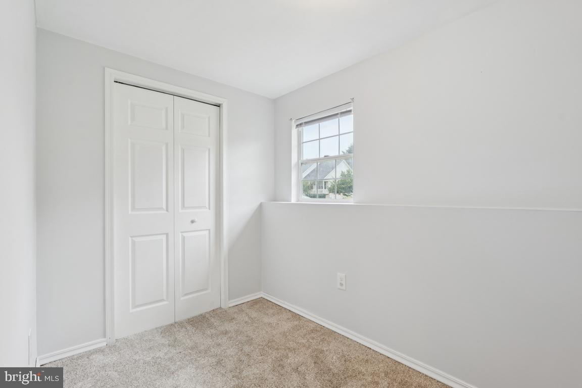 1151 Caton Road Hampstead, MD 21074 - Photo 38 of 43 an empty room with windows