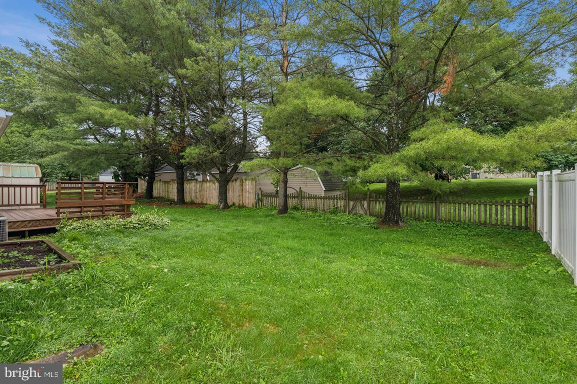 1151 Caton Road Hampstead, MD 21074 - Photo 41 of 43 a view of a backyard with a garden