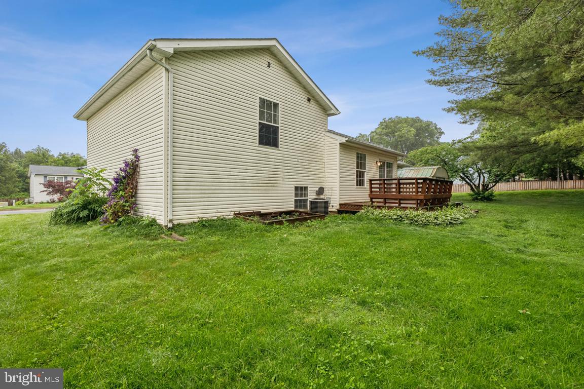 1151 Caton Road Hampstead, MD 21074 - Photo 42 of 43 a front view of house with yard and green space